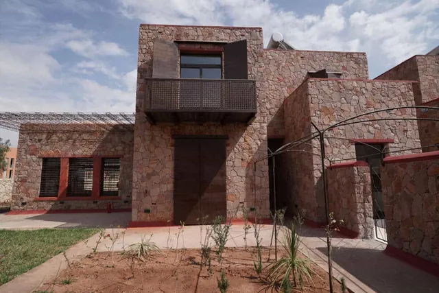 Villa des Chercheurs à Benguérir — construction en pierre pour l’UM6P / groupe OCP