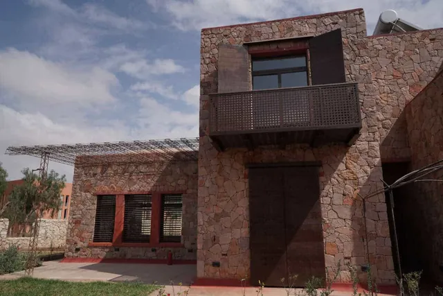 Villa des Chercheurs à Benguérir — construction en pierre pour l’UM6P / groupe OCP